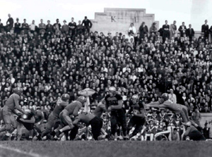 Which were the first college football teams to play on Thanksgiving?